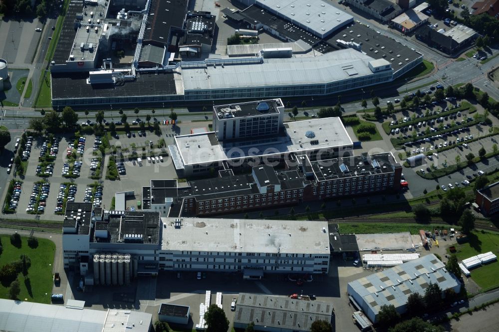 Aerial photograph Minden - Company grounds and facilities of Melitta Unternehmensgruppe Bentz KG in Minden in the state of North Rhine-Westphalia. The compound includes halls and technical facilities where products for home use and gastrononmy are being produced