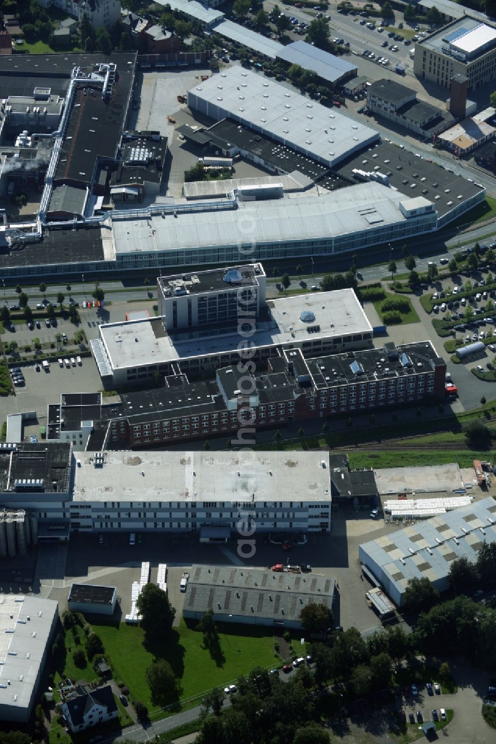 Minden from above - Company grounds and facilities of Melitta Unternehmensgruppe Bentz KG in Minden in the state of North Rhine-Westphalia. The compound includes halls and technical facilities where products for home use and gastrononmy are being produced