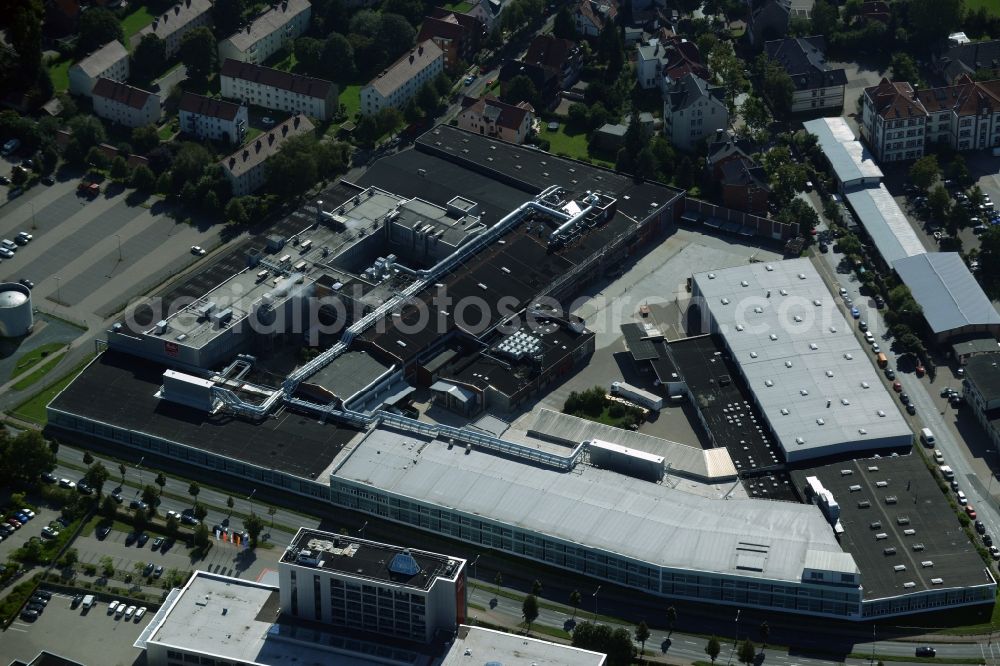 Minden from the bird's eye view: Company grounds and facilities of Melitta Unternehmensgruppe Bentz KG in Minden in the state of North Rhine-Westphalia. The compound includes halls and technical facilities where products for home use and gastrononmy are being produced