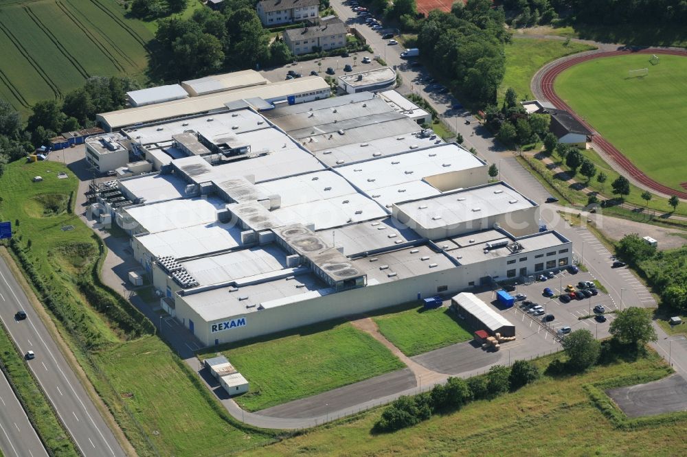 Aerial image Neuenburg am Rhein - Premises and company grounds of pharmaceutical company Rexam with warehouses, business buildings and production facilities in Neuenburg am Rhein in the state of Baden -Wuerttemberg. The packaging manufacturers for pharmaceutical products has now been taken over by the French group Nemera 