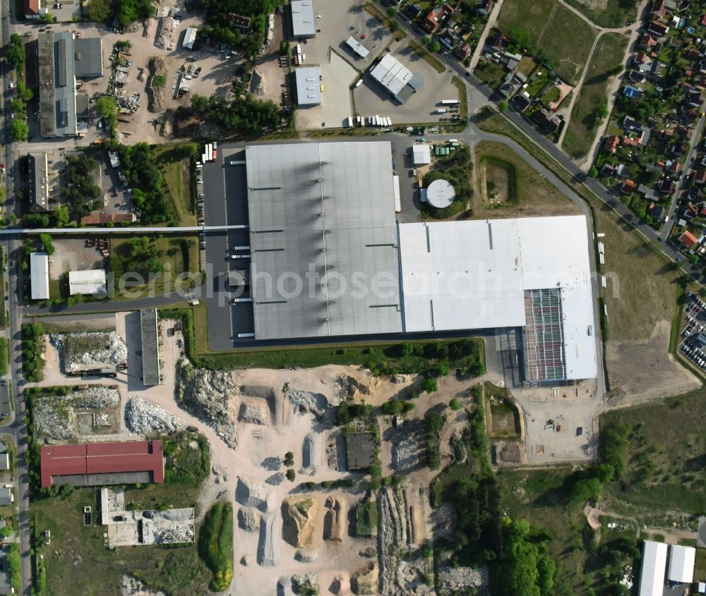 Fürstenwalde/Spree from the bird's eye view: Industrial and commercial area of R F L Reifen-Felgen-Logistik Speditions- und Lager GmbH on Traenkestrasse - Langewahler Strassein Fuerstenwalde/Spree in the state Brandenburg