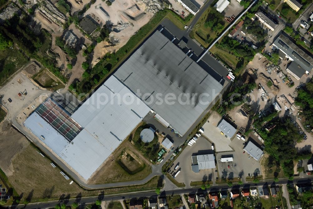 Aerial image Fürstenwalde/Spree - Industrial and commercial area of R F L Reifen-Felgen-Logistik Speditions- und Lager GmbH on Traenkestrasse - Langewahler Strassein Fuerstenwalde/Spree in the state Brandenburg