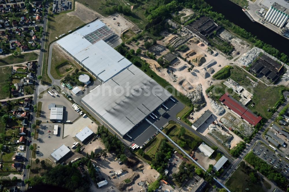 Aerial image Fürstenwalde/Spree - Industrial and commercial area of R F L Reifen-Felgen-Logistik Speditions- und Lager GmbH on Traenkestrasse - Langewahler Strassein Fuerstenwalde/Spree in the state Brandenburg