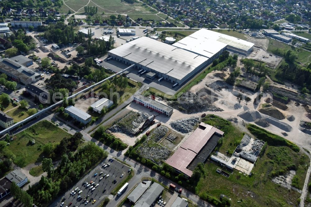 Aerial image Fürstenwalde/Spree - Industrial and commercial area of R F L Reifen-Felgen-Logistik Speditions- und Lager GmbH on Traenkestrasse - Langewahler Strassein Fuerstenwalde/Spree in the state Brandenburg