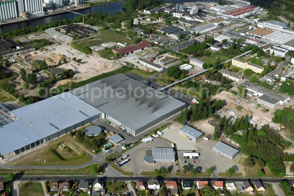 Fürstenwalde/Spree from the bird's eye view: Industrial and commercial area of R F L Reifen-Felgen-Logistik Speditions- und Lager GmbH on Traenkestrasse - Langewahler Strassein Fuerstenwalde/Spree in the state Brandenburg