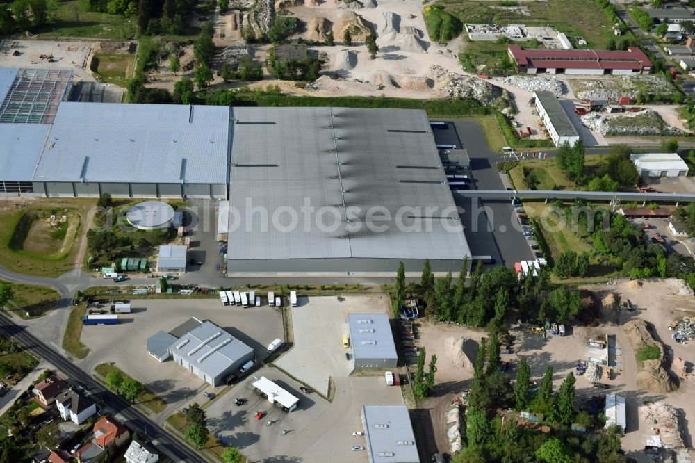 Aerial image Fürstenwalde/Spree - Industrial and commercial area of R F L Reifen-Felgen-Logistik Speditions- und Lager GmbH on Traenkestrasse - Langewahler Strassein Fuerstenwalde/Spree in the state Brandenburg