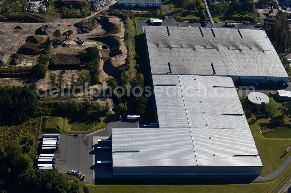 Fürstenwalde/Spree from the bird's eye view: Industrial and commercial area of R F L Reifen-Felgen-Logistik Speditions- und Lager GmbH on Traenkestrasse - Langewahler Strassein Fuerstenwalde/Spree in the state Brandenburg