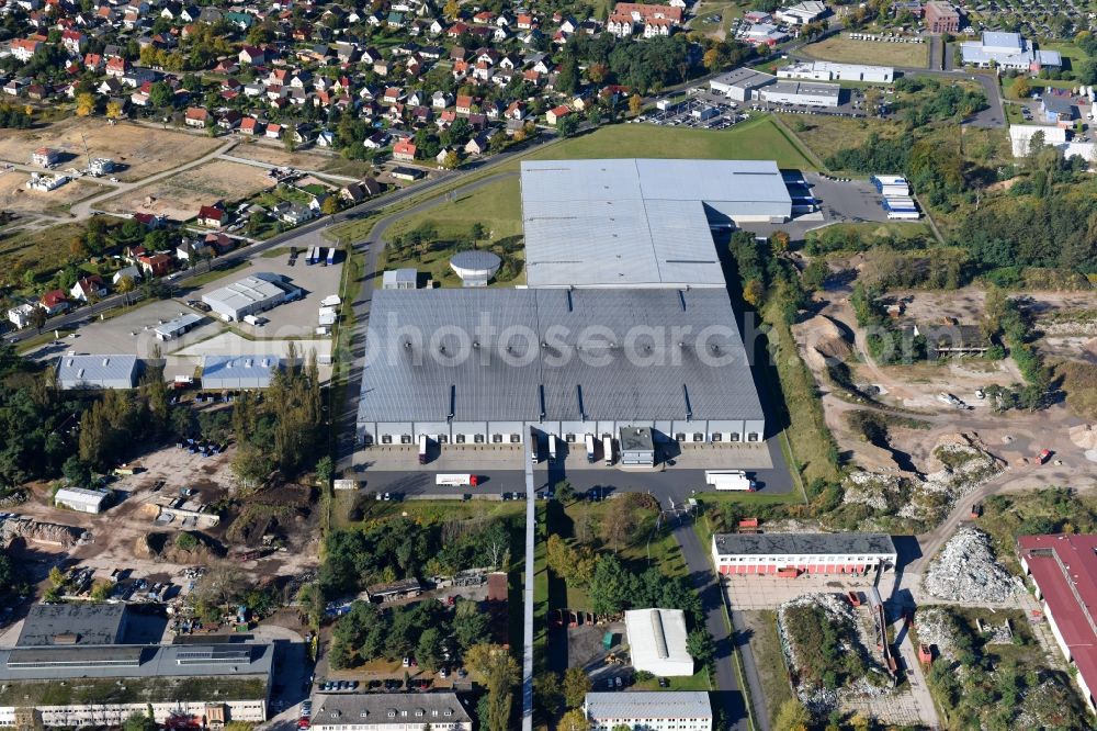 Aerial image Fürstenwalde/Spree - Industrial and commercial area of R F L Reifen-Felgen-Logistik Speditions- und Lager GmbH on Traenkestrasse - Langewahler Strassein Fuerstenwalde/Spree in the state Brandenburg