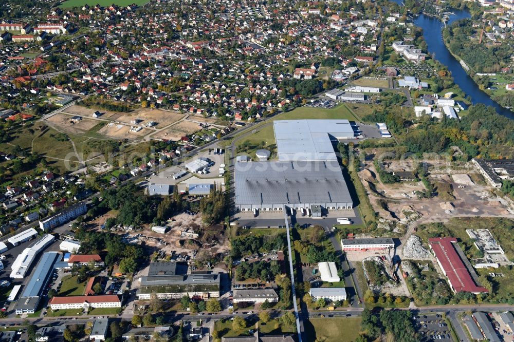 Aerial photograph Fürstenwalde/Spree - Industrial and commercial area of R F L Reifen-Felgen-Logistik Speditions- und Lager GmbH on Traenkestrasse - Langewahler Strassein Fuerstenwalde/Spree in the state Brandenburg