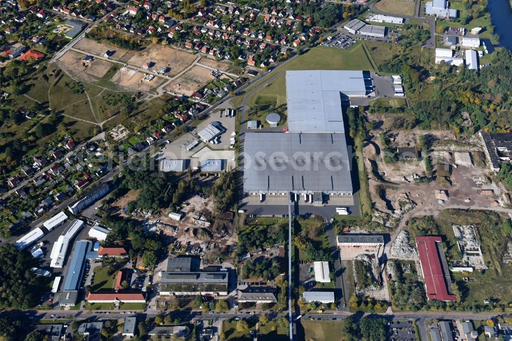 Fürstenwalde/Spree from the bird's eye view: Industrial and commercial area of R F L Reifen-Felgen-Logistik Speditions- und Lager GmbH on Traenkestrasse - Langewahler Strassein Fuerstenwalde/Spree in the state Brandenburg