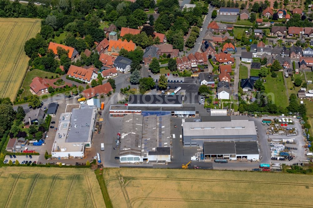 Aerial photograph Beckum - Company grounds and facilities of SCHRADER-T+A Fahrzeugbau GmbH & Co. KG and of Stoevesand-Lackiererei GmbH on Dorfstrasse in Beckum in the state North Rhine-Westphalia, Germany