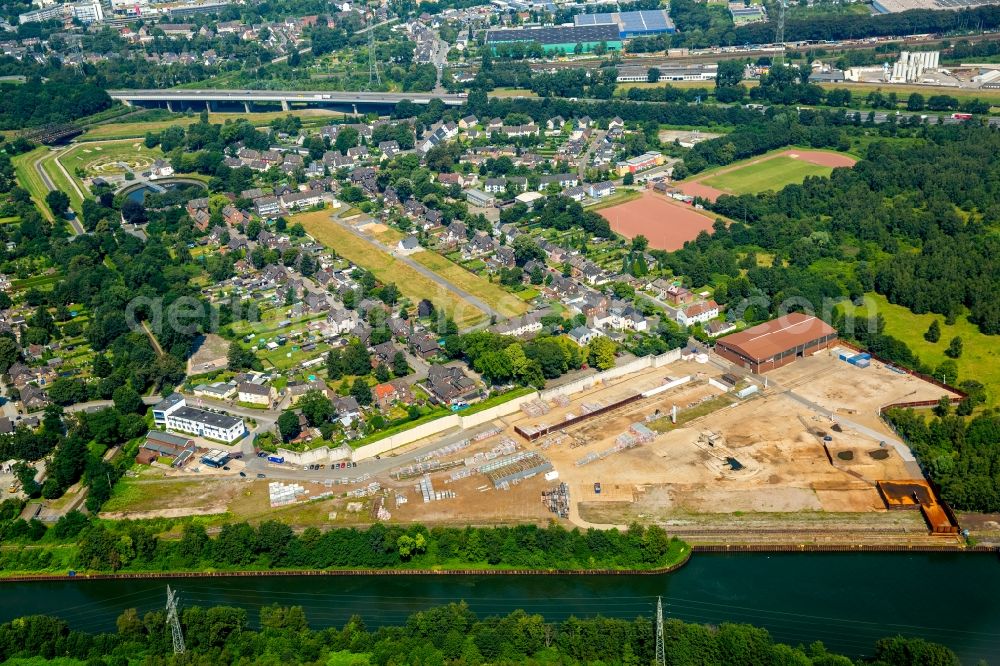 Bottrop from the bird's eye view: Premises of the metal recycling company TSR Recycling GmbH & Co. KG on the riverbanks of Rhine-Herne canal in the Ebel part of Bottrop in the state of North Rhine-Westphalia