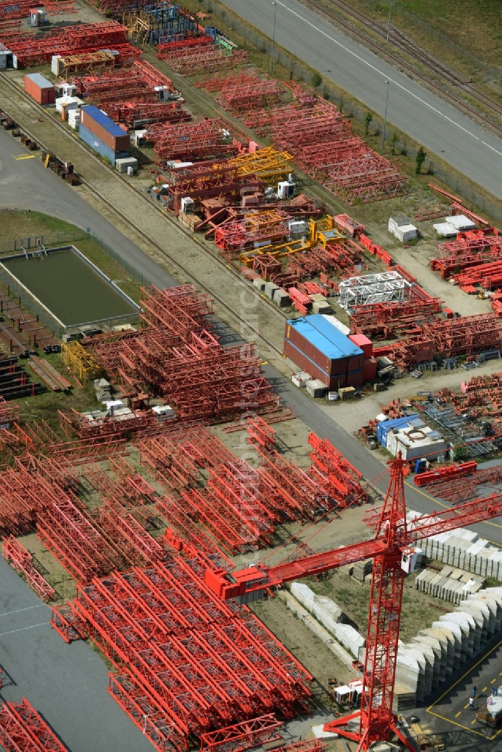 Aerial image Luckau - Company grounds and facilities of the Wolffkran works in Luckau in the state of Brandenburg. Tower cranes are being produced on site with the large outdoor facilities