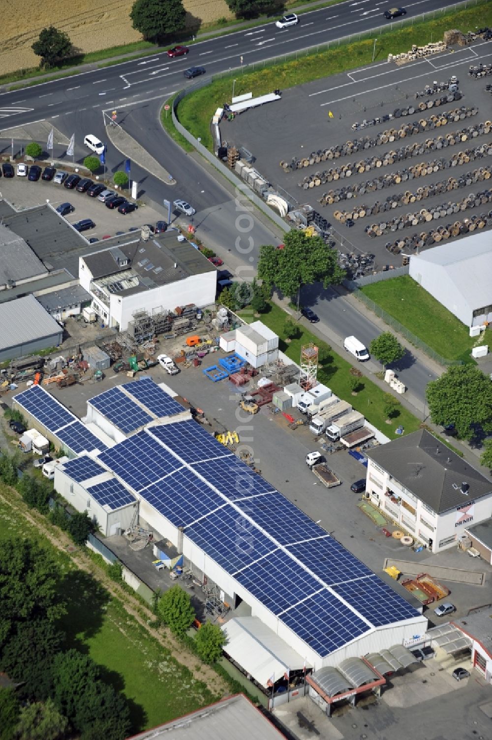 Aerial image Köln - COLOGNE 07/24/2012 View of the headquarters of the servant Werner GmbH & Co. KG to the paint industry Niederkasseler Road 6 in Cologne in North Rhine-Westphalia. The long-established specialist company is the leading service providers in the tower-building renovation and expansion