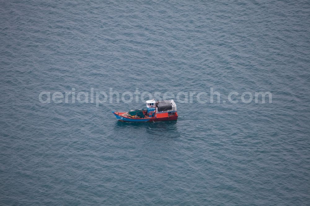 Aerial image Tambon Ko Kaeo - Fishing boat in the Andaman Sea near Phuket, Thailand