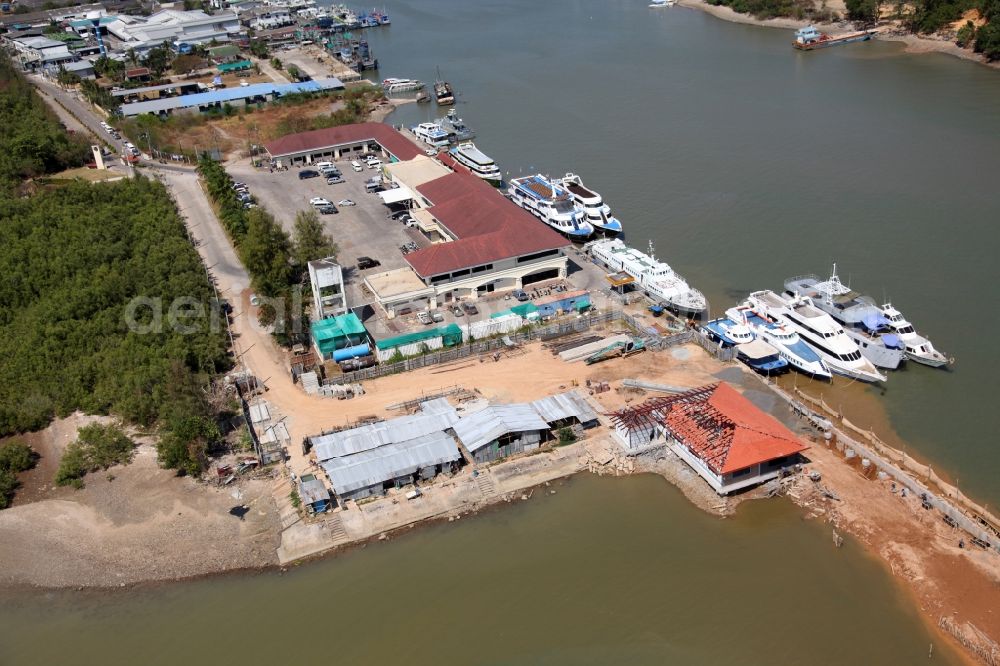 Ratsada from above - Fishing port of Ratsada on Phuket Island in Thailand. There are numerous fishing boats and ships in him. The port is also the starting point for ferries and excursion boats to neighboring islands