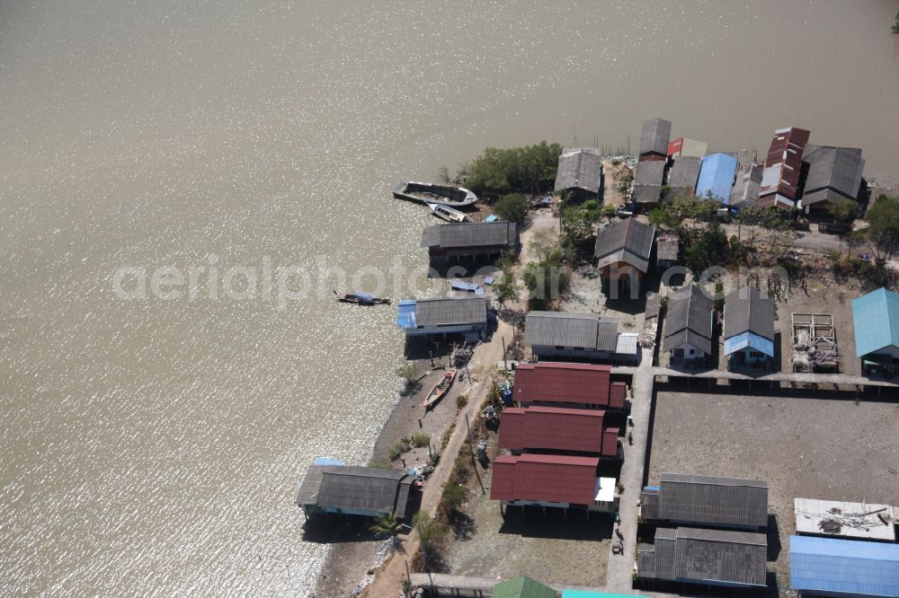 Aerial image Ratsada - Fishing port of Ratsada on Phuket Island in Thailand. There are numerous fishing boats and ships in him. The port is also the starting point for ferries and excursion boats to neighboring islands