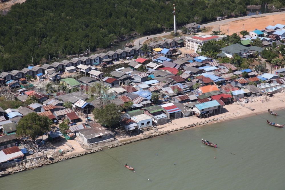 Ratsada from the bird's eye view: Fishermen's cottages and homes on the outskirts of Ratsada on the island Phuket in Thailand