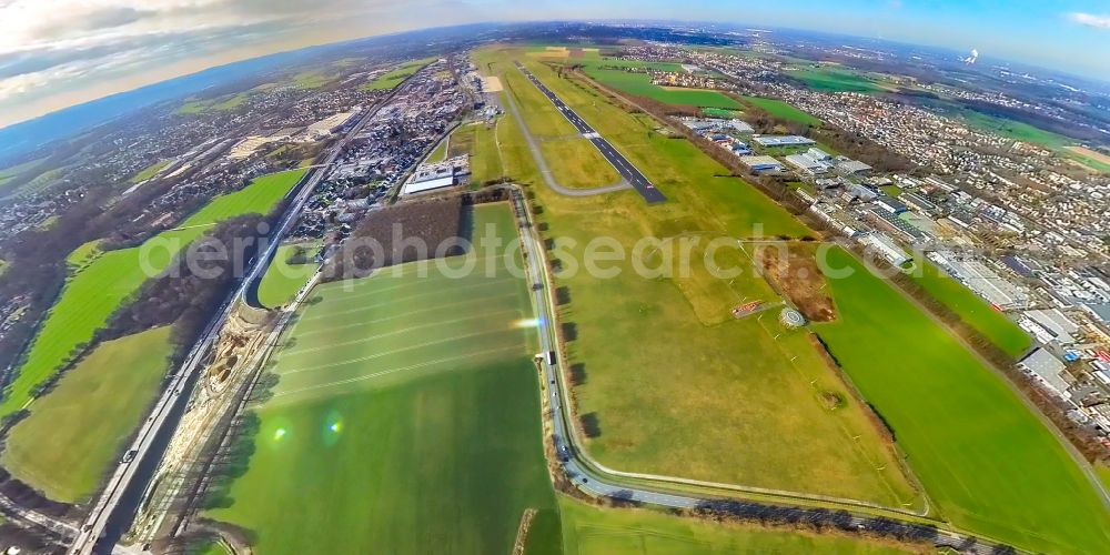 Dortmund from the bird's eye view: Fisheye perspective runway with hangar taxiways and terminals on the grounds of the airport in Dortmund in the state North Rhine-Westphalia, Germany