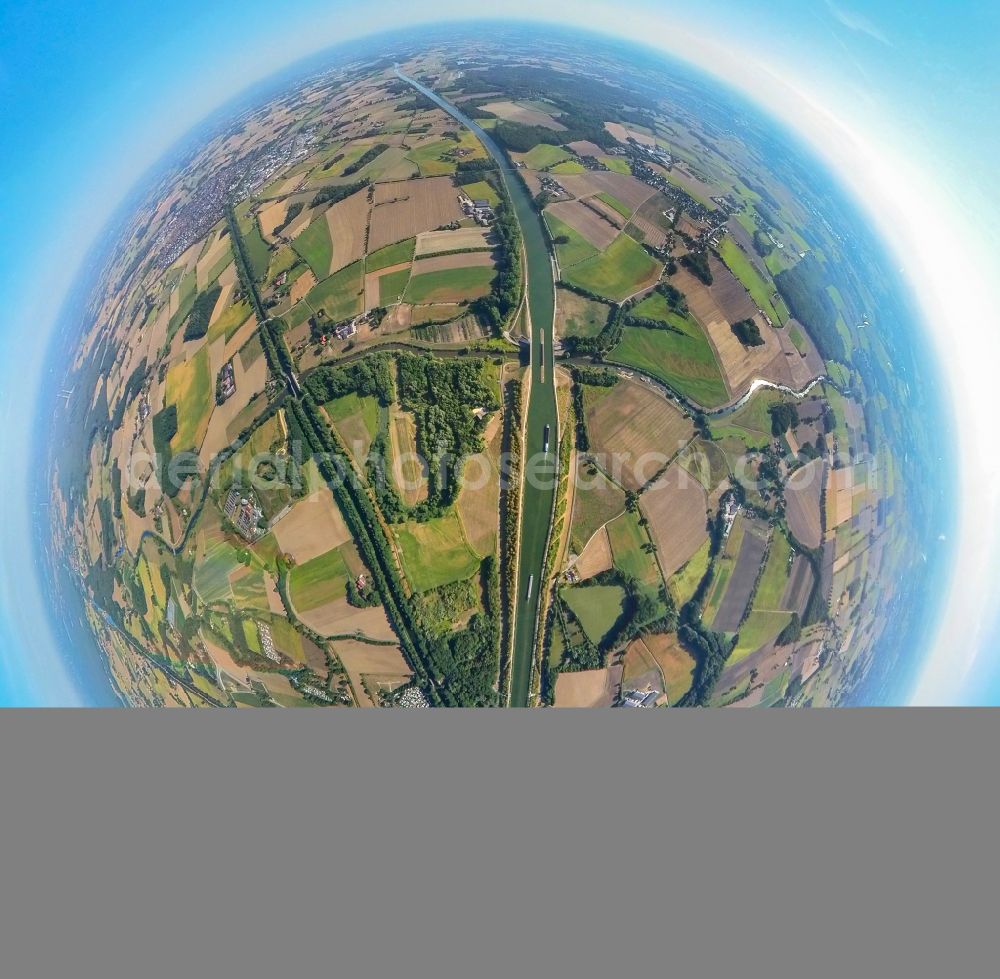 Pelkum from the bird's eye view: Fisheye perspective channel flow and river banks of the waterway shipping Dortmund-Ems-Kanal in Pelkum at Ruhrgebiet in the state North Rhine-Westphalia, Germany