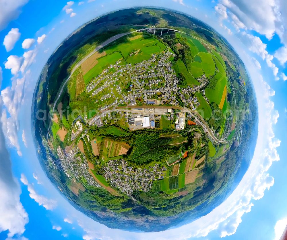 Nuttlar from above - Fisheye perspective city view of the streets and houses of the residential areas with Talbruecke Nuttlar in Nuttlar in the Sauerland in the state North Rhine-Westphalia, Germany