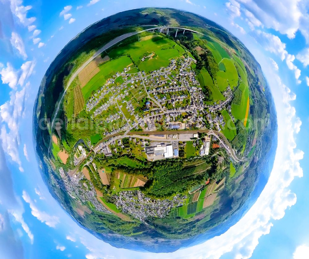 Aerial image Nuttlar - Fisheye perspective city view of the streets and houses of the residential areas with Talbruecke Nuttlar in Nuttlar in the Sauerland in the state North Rhine-Westphalia, Germany