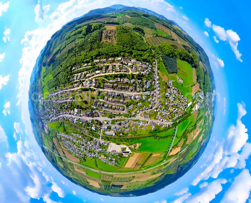 Velmede from the bird's eye view: Fisheye perspective village view on the edge of agricultural fields and land on street Abt-Anno-Strasse in Velmede at Sauerland in the state North Rhine-Westphalia, Germany