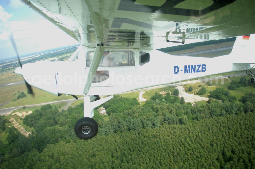 Aerial image Werneuchen - Fisheye-Perspektive auf das Ultraleichtflugzeug WT-01 der Agentur bei einem Flug in der Nähe des Flugplatzes Werneuchen.