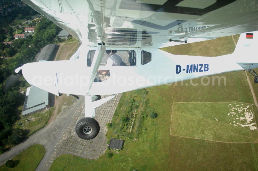 Aerial image Werneuchen - Fisheye-Perspektive auf das Ultraleichtflugzeug WT-01 der Agentur bei einem Flug in der Nähe des Flugplatzes Werneuchen.