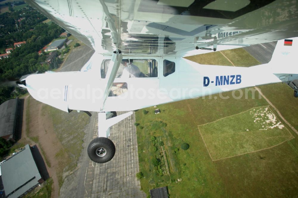 Aerial photograph Werneuchen - Fisheye-Perspektive auf das Ultraleichtflugzeug WT-01 der Agentur bei einem Flug in der Nähe des Flugplatzes Werneuchen.