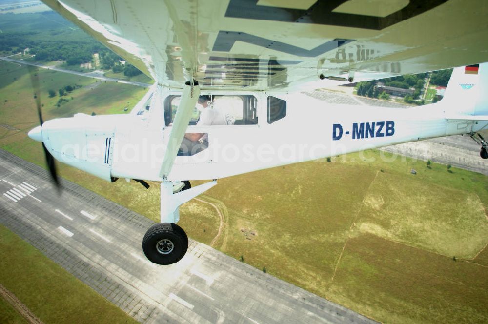 Aerial photograph Werneuchen - Fisheye-Perspektive auf das Ultraleichtflugzeug WT-01 der Agentur bei einem Flug in der Nähe des Flugplatzes Werneuchen.