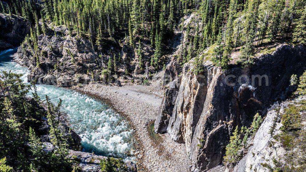 Cline River from the bird's eye view: Fjords with lake and valley glaciers in the rock and mountain landscape Cline River on street David Thompson Highway in Cline River in Alberta, Canada