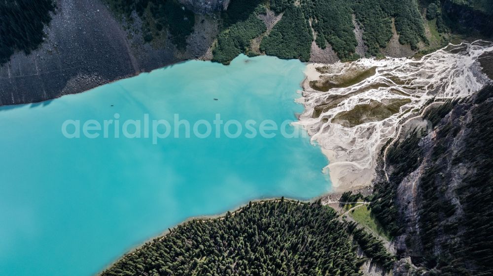 Lake Louise from the bird's eye view: Fjords with lake and valley glaciers in the rock and mountain landscape Zufluss of Lake Louise on street Lake Louise Lakeshore Trail in Lake Louise in Alberta, Canada