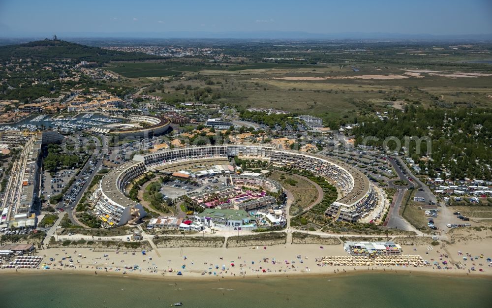 Aerial image Agde - Naturist nudist sunbathing nudists and hotel complex on the Mediterranean beach of Agde in the province of Languedoc-Roussillon in France