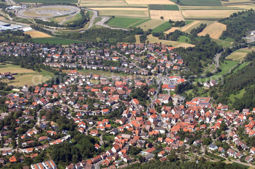 Aerial image Flacht - Flacht ist eine Ortsgemeinde und liegt im Taunus/ Rheinland-Pfalz, im Hintergrund kann man das Porsche- Entwicklungszentrum erkennen. Am 17. Februar 881 wurde in einer Urkunde der Abtei Prüm erstmals eine Kirche in Flachta erwähnt.