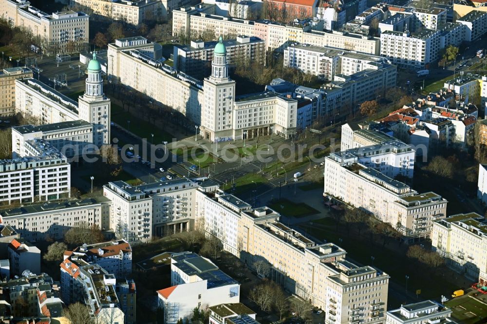 Aerial image Berlin - Street guide of famous promenade and shopping street Karl-Marx-Allee with the square at the Frankfurter Tor in the district Friedrichshain in Berlin, Germany