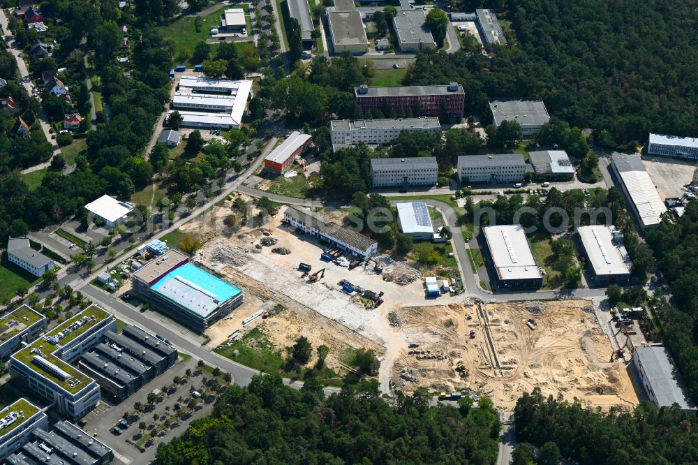 Aerial photograph Berlin - Construction site for surface demolition and unsealing work to expand the production site of the German Institute for Cell and Tissue Replacement gGmbH in the Innovation Park Wuhlheide (IPW) in Berlin, Germany