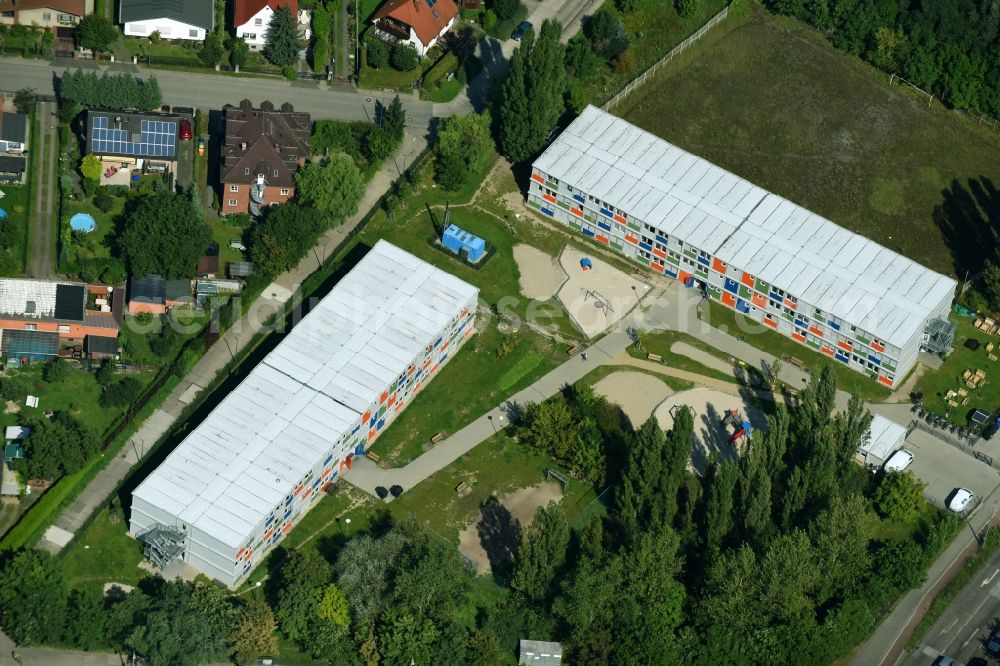 Berlin from the bird's eye view: Container settlement as temporary shelter and reception center for refugees on Blumberger Damm corner Landsberger Allee in the district Bezirk Marzahn in Berlin