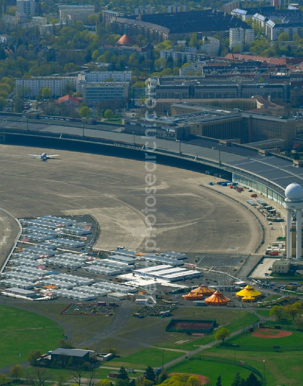 Berlin from the bird's eye view: Container settlement as temporary shelter and reception center for refugees on Columbiadamm in the district Tempelhof in Berlin, Germany