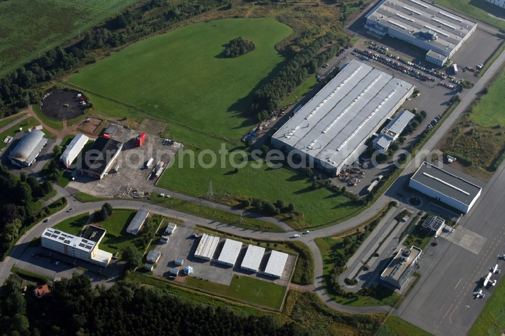 Jahnsdorf Erzgebirge from the bird's eye view: Container settlement as temporary shelter and reception center for refugees at the airfield in Jahnsdorf Erzgebirge in the state Saxony