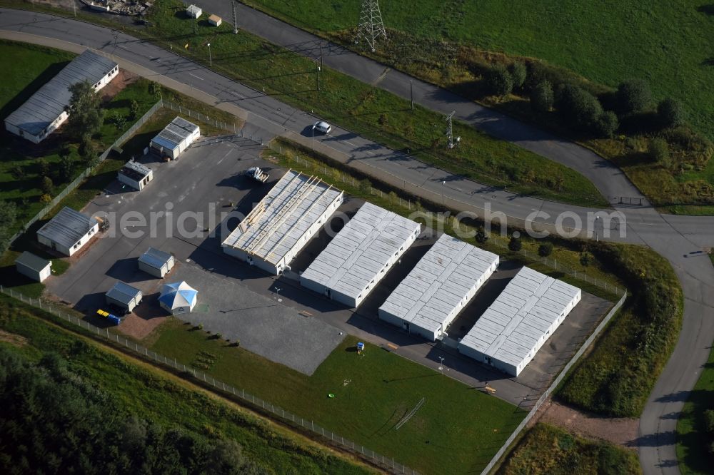 Aerial image Jahnsdorf Erzgebirge - Container settlement as temporary shelter and reception center for refugees at the airfield in Jahnsdorf Erzgebirge in the state Saxony