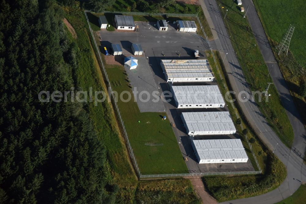 Jahnsdorf Erzgebirge from the bird's eye view: Container settlement as temporary shelter and reception center for refugees at the airfield in Jahnsdorf Erzgebirge in the state Saxony