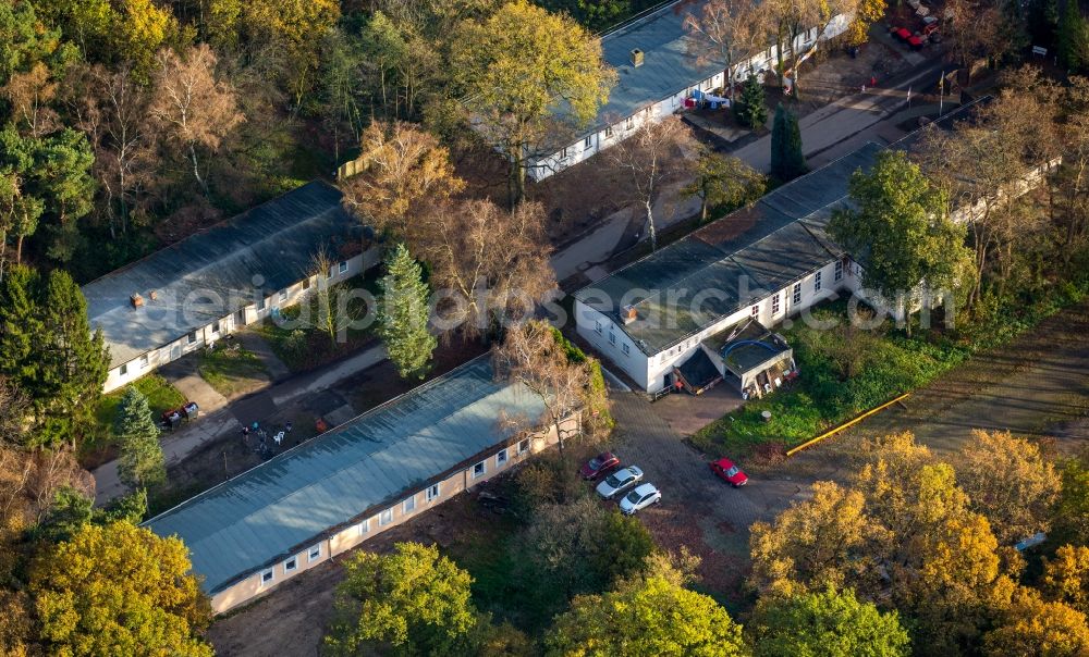 Dinslaken from the bird's eye view: Construction site for the new building of Asylum accommodation buildings in den ehemaligen Bergwerksbaracken An der Fliehburg in Dinslaken in the state North Rhine-Westphalia