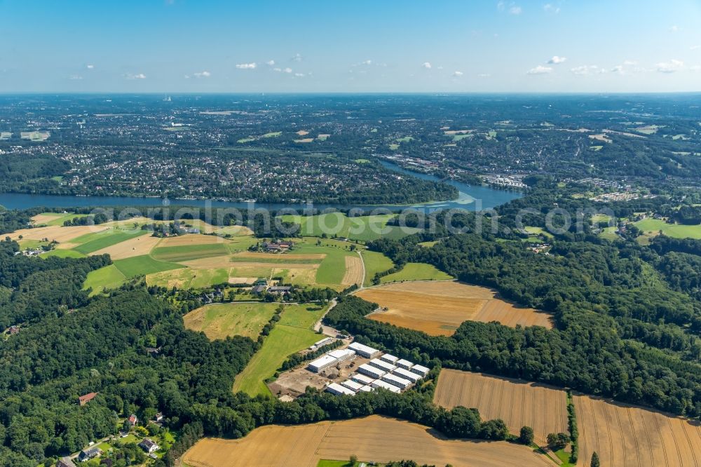 Aerial photograph Fischlaken, Essen - Construction site for the new building of Asylum accommodation buildings in Fischlaken, Essen in the state North Rhine-Westphalia