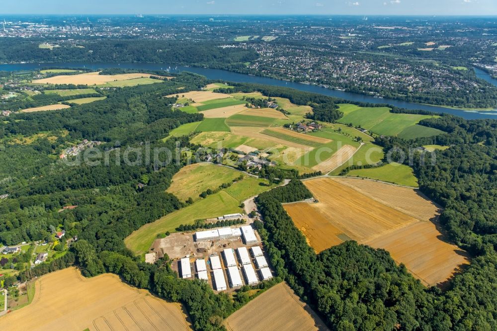 Fischlaken, Essen from above - Construction site for the new building of Asylum accommodation buildings in Fischlaken, Essen in the state North Rhine-Westphalia