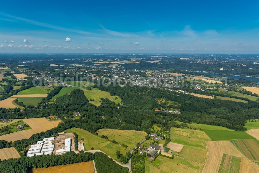 Aerial photograph Fischlaken, Essen - Construction site for the new building of Asylum accommodation buildings in Fischlaken, Essen in the state North Rhine-Westphalia