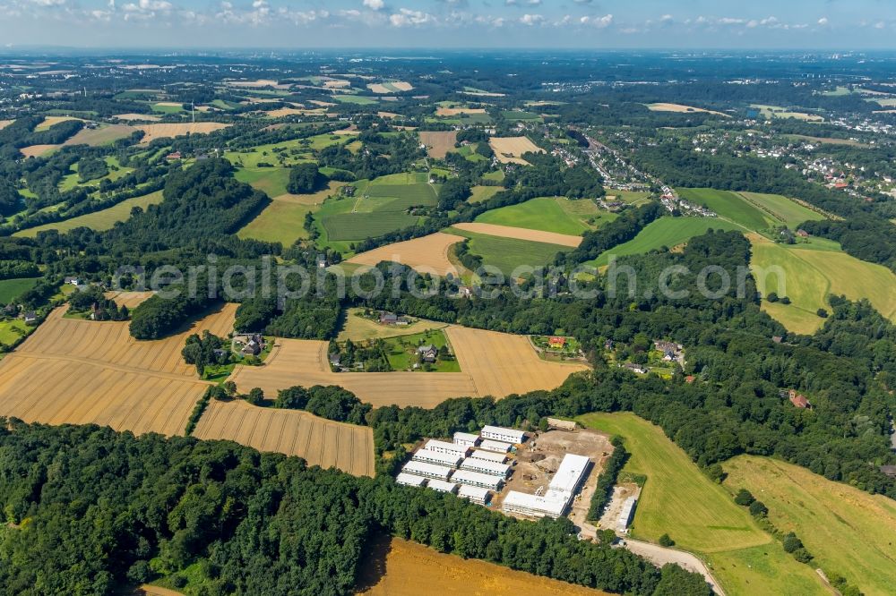 Fischlaken, Essen from above - Construction site for the new building of Asylum accommodation buildings in Fischlaken, Essen in the state North Rhine-Westphalia