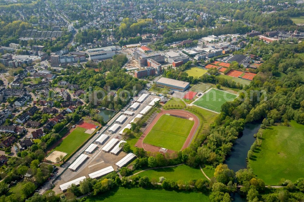 Aerial photograph Mülheim an der Ruhr - Construction site for the new building of Asylum accommodation buildings place Saarner Kirmesplatz on Stadium in Muelheim an der Ruhr in the state North Rhine-Westphalia