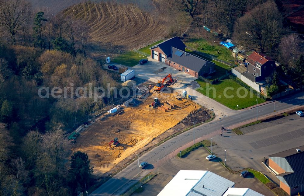 Isselburg from above - Construction site for the new building of Asylum accommodation buildings adjacent to the fire station on Stromberg in Isselburg in the state of North Rhine-Westphalia