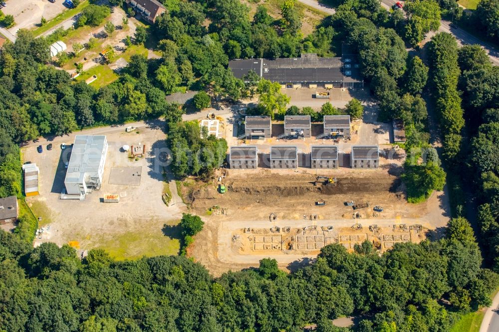 Gelsenkirchen from the bird's eye view: Construction site to build Fluechtlingsheim- and Asylunterkunft- buildings on the grounds of THW Adenauerallee Gelsenkirchen in North Rhine-Westphalia